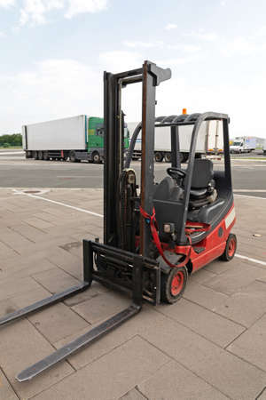 Gas Powered Red Forklift Cargo Truck Outside