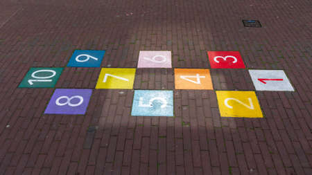 Colourful Hopscotch Playground Markings Numbers at Pavement