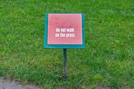 Do Not Walk On the Grass Warning Sign