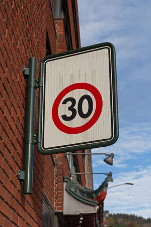Caution Traffic Sign Thirty Zone in Cityの写真素材