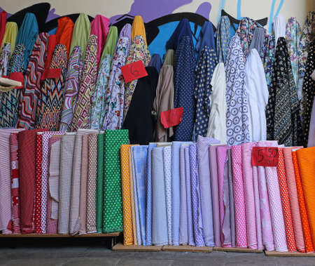 Colorful Textile Fabric Rolls in Material Shopの写真素材