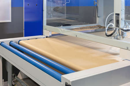 Automated Laminator Machine in Wood Work Shop