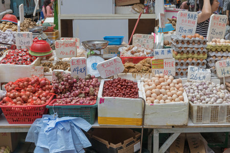 KOWLOON, HONG KONG - APRIL 22, 2017: Various Food for Sale at Farmers Market in Kowloon, Hong Kong.のeditorial素材