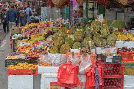 KOWLOON, HONG KONG - APRIL 22, 2017: Fresh Fruits and Vegetables at Street Market Stall in Mong Kok Kowloon, Hong Kong.のeditorial素材