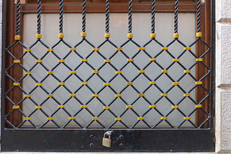 Safety Bars Protection With Padlock at Windowの写真素材