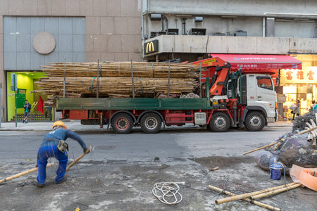 Kowloon, Hong Kong - April 22, 2017: Bamboo Scaffoldings at Truck in Mong Kok, Hong Kong, China.のeditorial素材