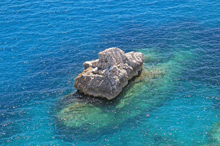Aerial View of Big Stone Rock in Blue Adriatic Sea