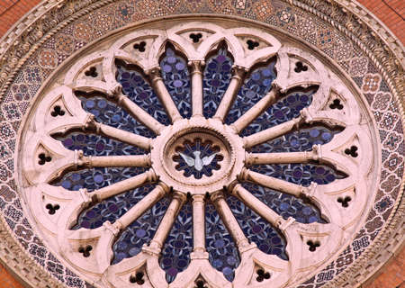 Rose Window With Stained Glass at Church in Romeの写真素材