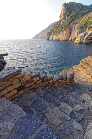 Stairs to Sea at Rough Liguria Coast in Italy