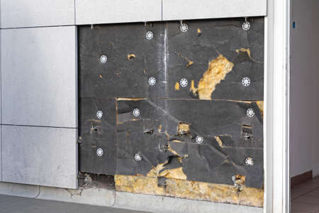 Damaged Layer of Insulation in Modern Building Wall