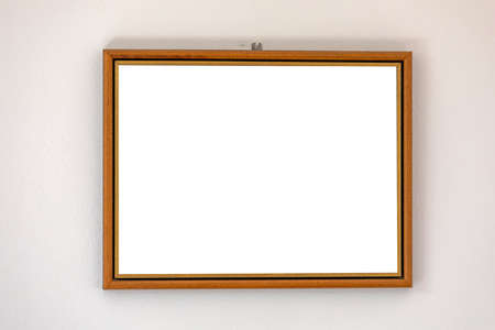 Empty Space Wooden Picture Frame at White Wallの写真素材