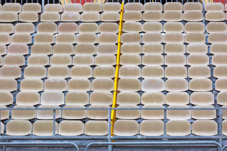 Empty Spectator Seats at Outdoor Venue Stands