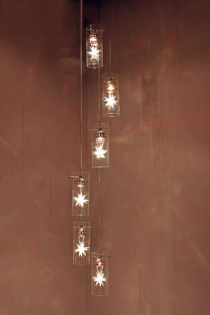 Modern chandelier in the corner of room