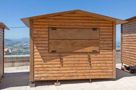 Temporary Wooden Logs Kiosk in San Marino