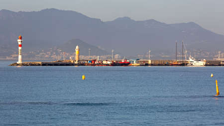 Lighthouse at Pier in Cannes France Mediterranean Seaの写真素材