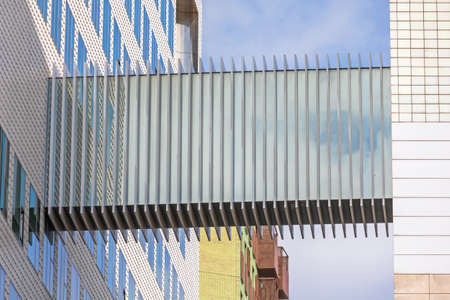 Pedestrian Glass Bridge Between Two Modern Buildingsの写真素材