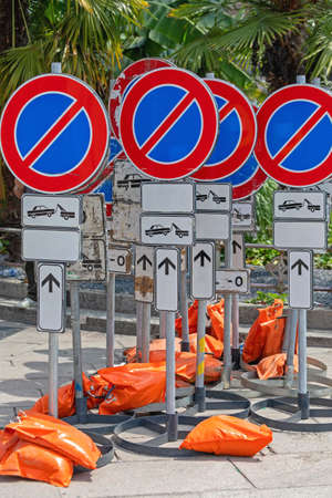 No Parking Traffic Signs Secured With Sand Bagsの写真素材