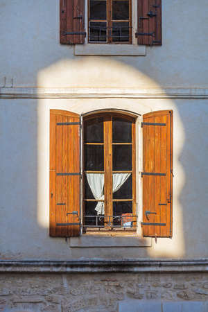 Sun Rays at House Window in Arles Franceの写真素材