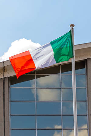 Italian National Flag Tricolor in Front of Building