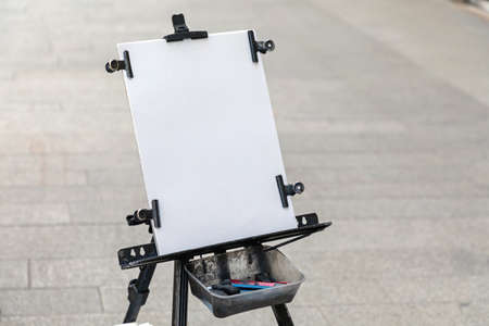 Empty Paper in Easel Holder at Street