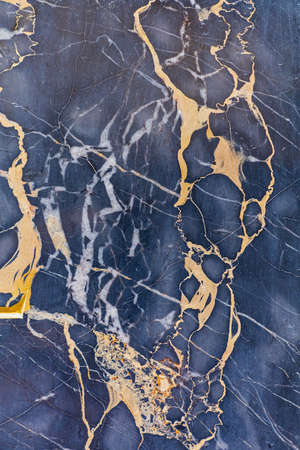 Golden Veins in Dark Marble Stone Luxury
