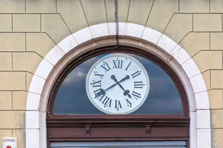 Big Round Roman Clock in Arch Italy