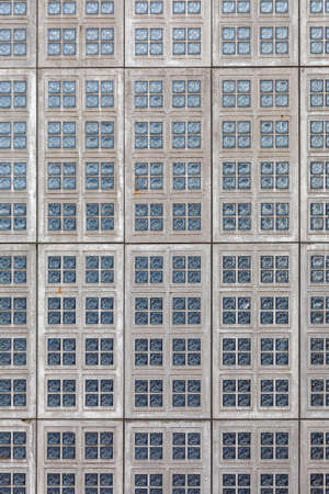 Glass Cubes Windows at Concrete Wall Buildingの写真素材