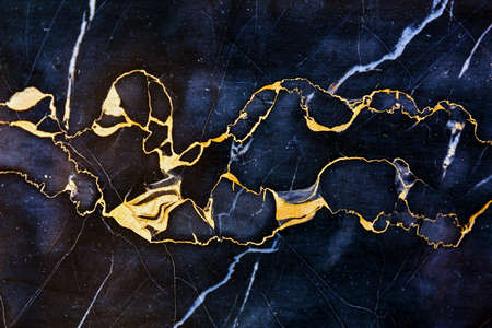 Golden Veins in Dark Marble Stone Luxuryの写真素材