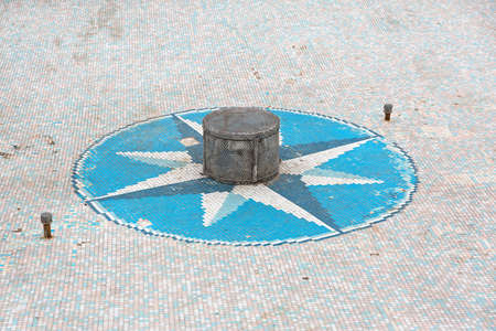 Compass Star at Bottom of Empty Water Fountainの写真素材