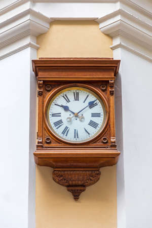 Old Wooden Clock Roman Dial at Wall