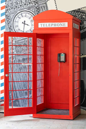 Open Door at Red Telephone Box Not Original