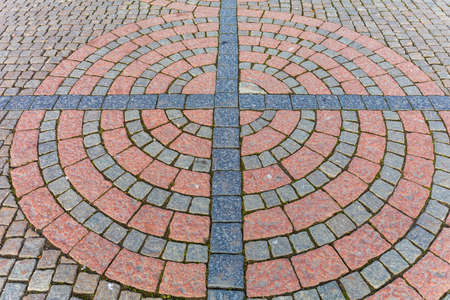 Spiral Cobblestones Street Pavement Mosaic in Norwayの写真素材