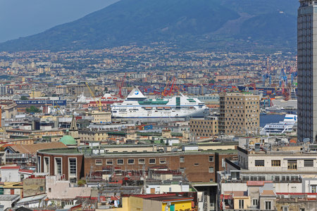 Naples, Italy - June 23, 2014: Cityscape of Naples With Big Cruise Ship at Port in Napoli, Italy.のeditorial素材