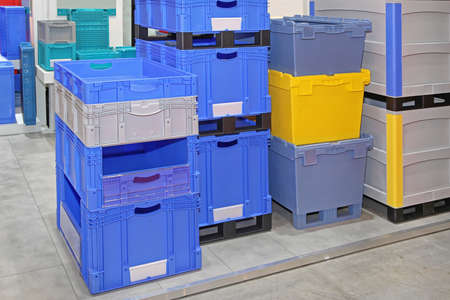 Colourful plastic boxes and crates for transport