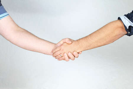 Two Men Handshake at White Backgroundの写真素材