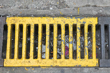 Yellow Storm Drain at Street in Hong Kongの写真素材