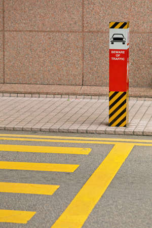 Beware of Traffic Sign Post at Crosswalk