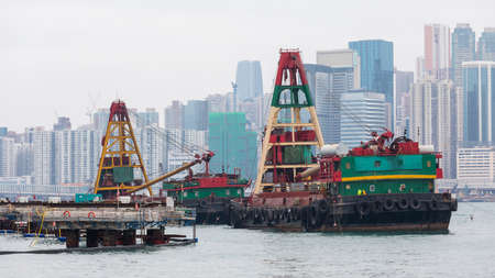Big Construction Crane at Barge in Hong Kong