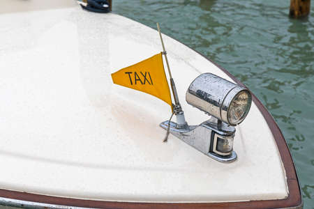 Sign Taxi Flag at Boat in Venice Italyの写真素材