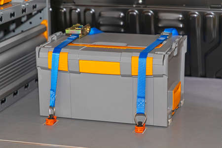 Transport Box Load Secured With Ratchet Straps in Van