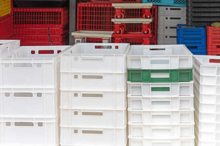 Stacked White Plastic Crates at Farmの写真素材