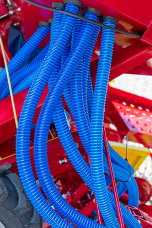 Many Blue Hose Pipes Tubes at Agriculture Equipmentの写真素材