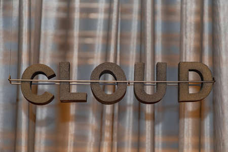 Black Sponge 3d Letters Cloud in Front of Curtainsの写真素材