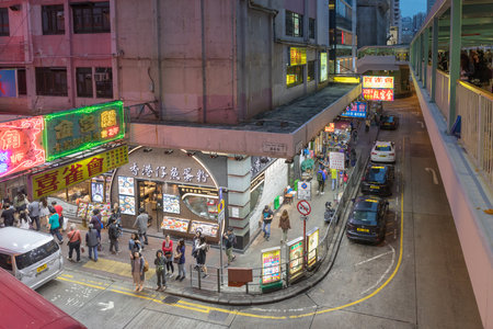 Kowloon, Hong Kong - April 22, 2017: Evening at Mong Kok Road in Kowloon, Hong Kong.のeditorial素材