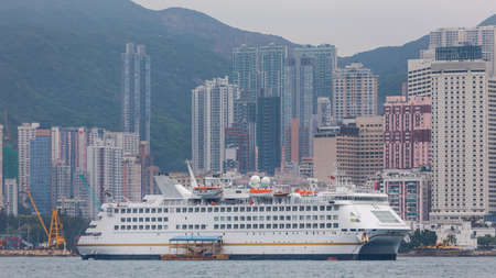 Docked Cruise Ship at Victoria Harbour in Hong Kongの写真素材