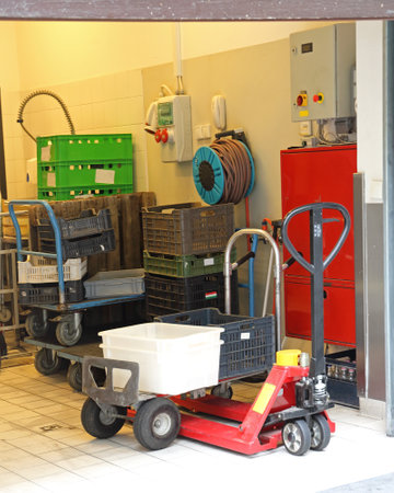 Pallet Jack Dolly Cart With Crates in Storage and Utility Room