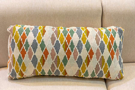 One Modern Rhomb Style Pillow at Sofa