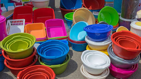 Many Various Colourful Plastic Bowls and Buckets
