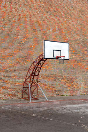 Basketball Hoop Sport Court at Bricks Wall