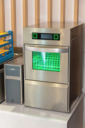 Professional Dishwasher Machine in Commercial Restaurant Kitchen
